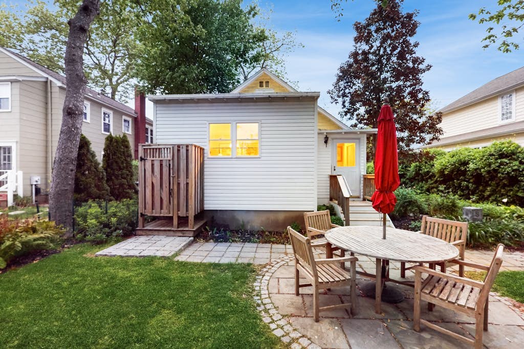Dog-friendly 2-story home near beach with screened porch, fast WiFi, W/D, & AC