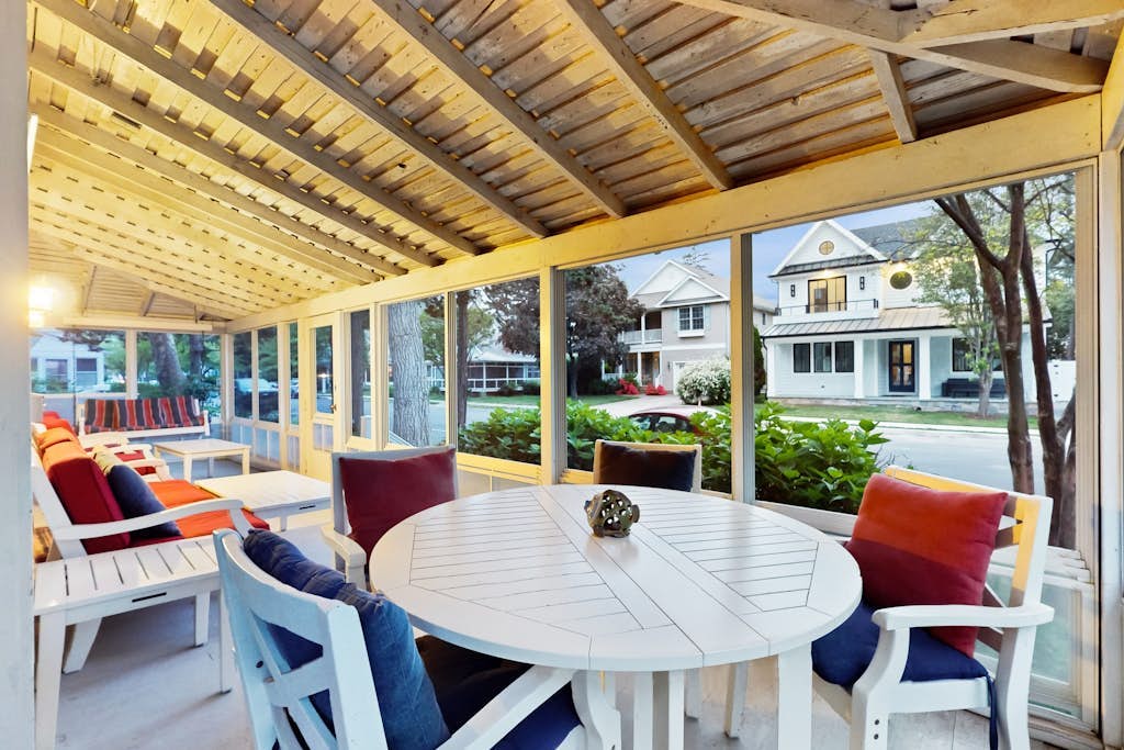 Dog-friendly 2-story home near beach with screened porch, fast WiFi, W/D, & AC