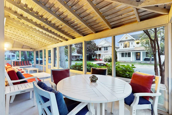 Dog-friendly 2-story home near beach with screened porch, fast WiFi, W/D, & AC