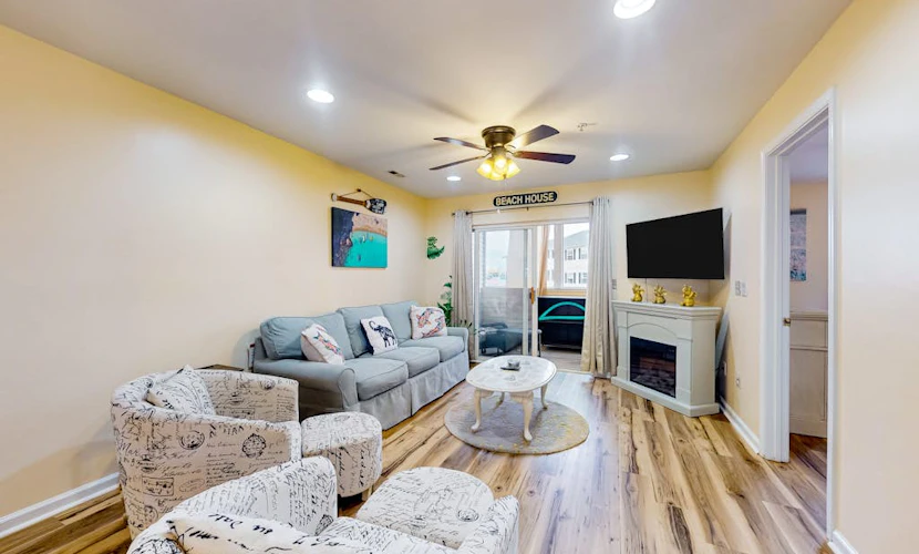 The Palms water-view condo near beach with outdoor pool, streaming, balcony, AC