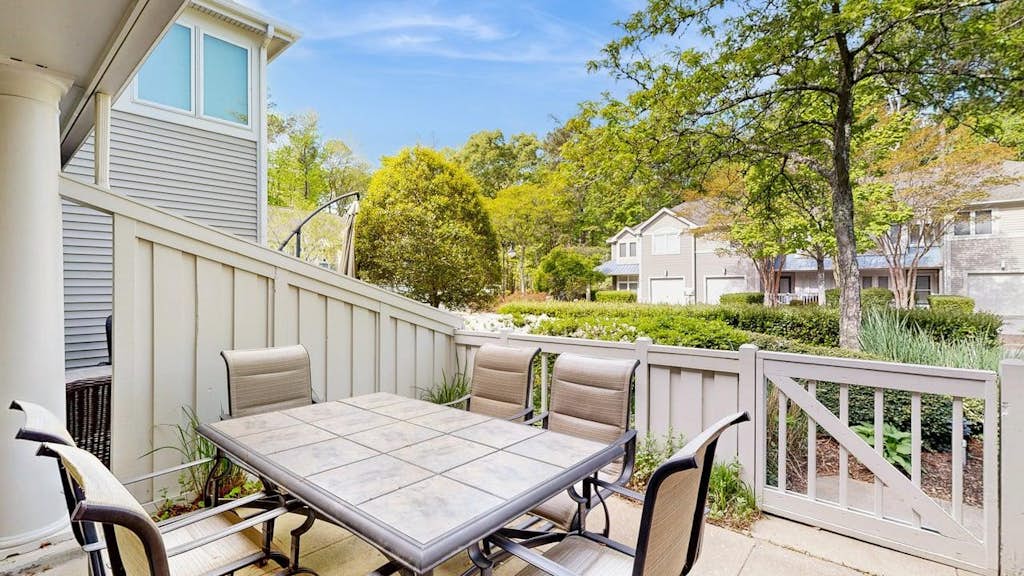 Sea Colony Tennis townhouse fireplace, tennis court, & balcony