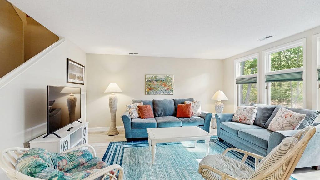 Sea Colony Tennis townhouse fireplace, tennis court, & balcony