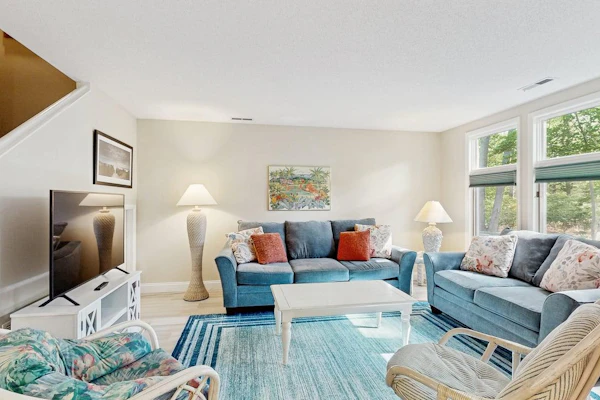 Sea Colony Tennis townhouse fireplace, tennis court, & balcony