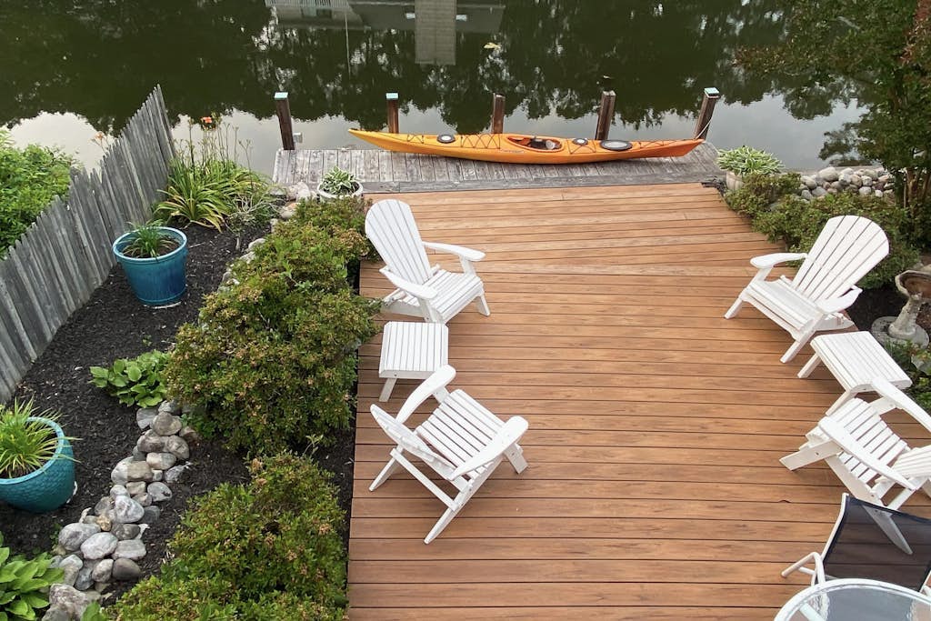 South Bethany canal-front house w/ grill, boat dock, and outdoor shower