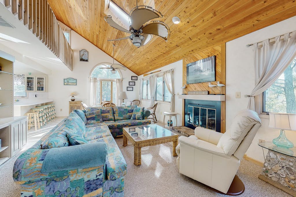 South Bethany canal-front house w/ grill, boat dock, and outdoor shower