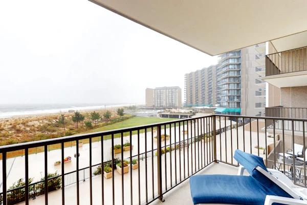 Sea Colony 3rd floor condo w/ ocean view, shared tennis court, elevator, and gym