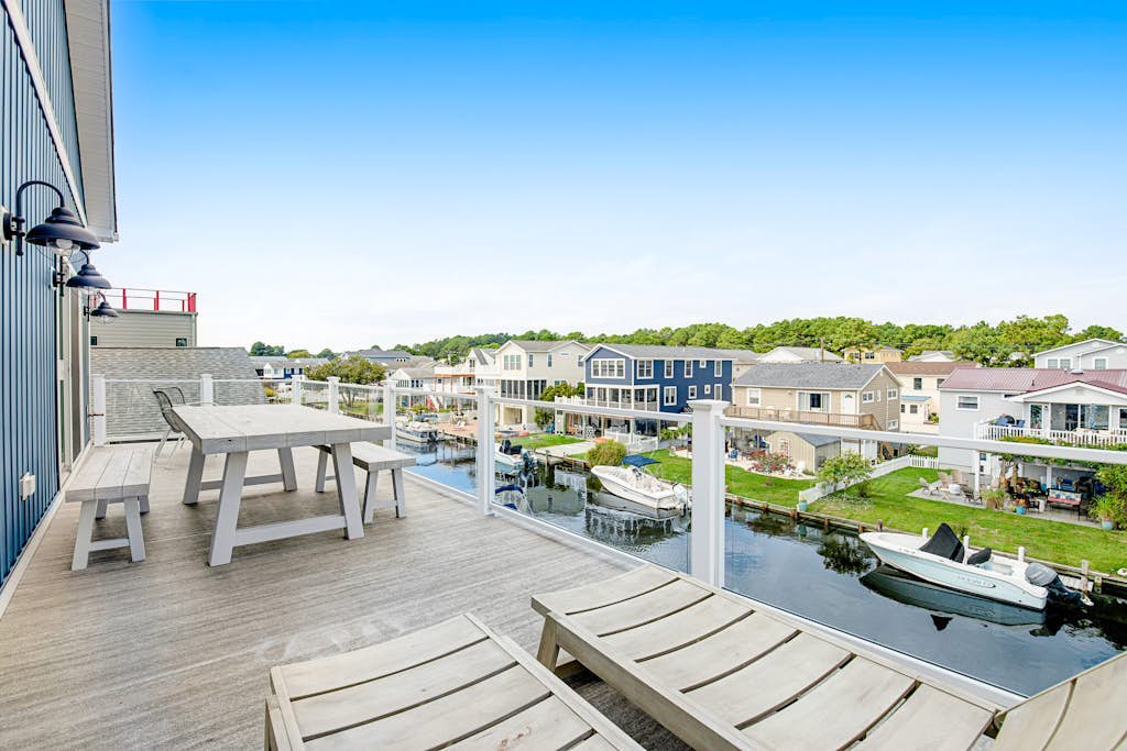 Town of South Bethany canal-front home with dock & decks - two blocks to beach