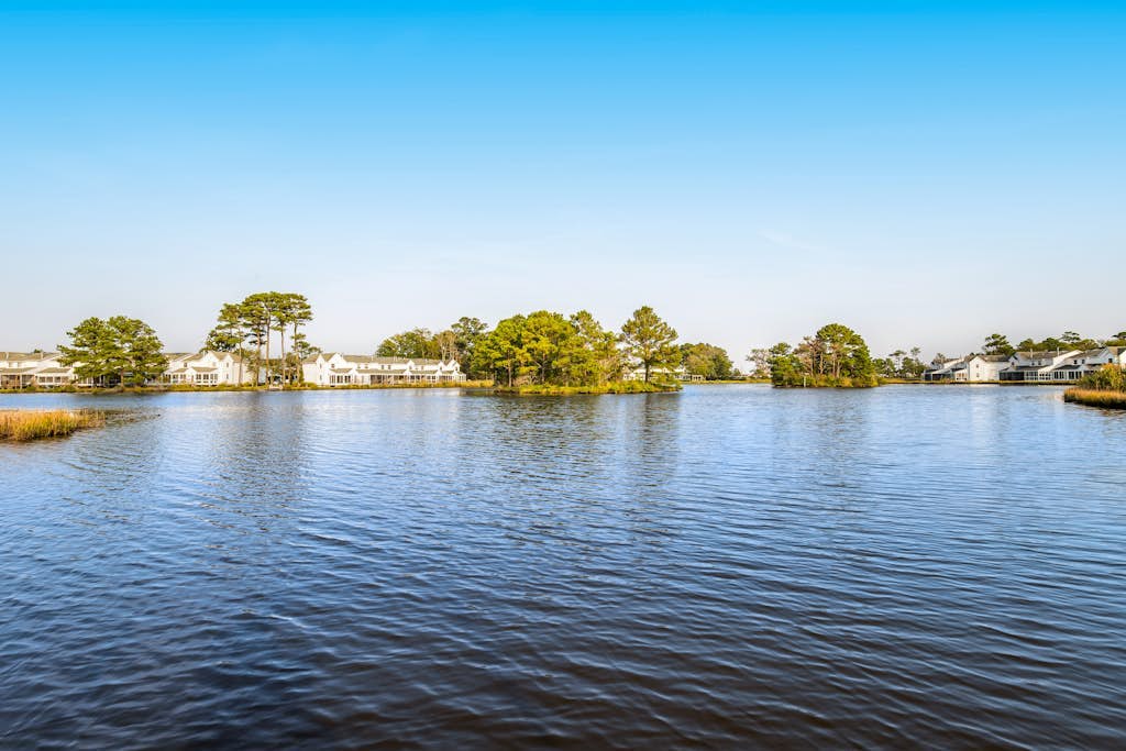 Mallard Lakes Home w/Beautiful Water Views From Screened-In Porch, Shared Pool, WD