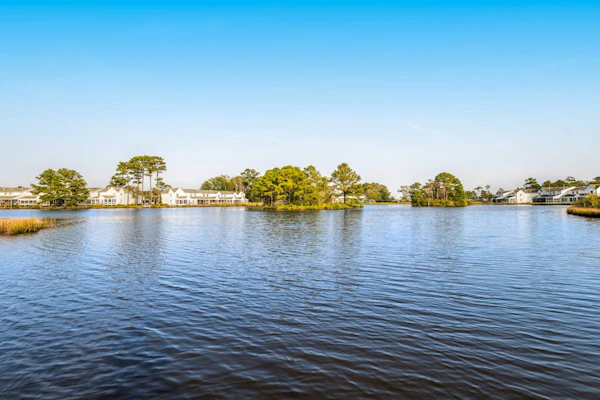 Mallard Lakes Home w/Beautiful Water Views From Screened-In Porch, Shared Pool, WD