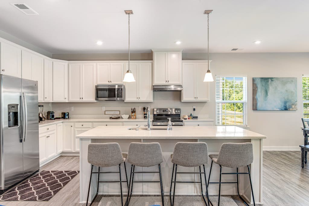 Beach retreat home with covered patio, W/D, fast WiFi, and central AC