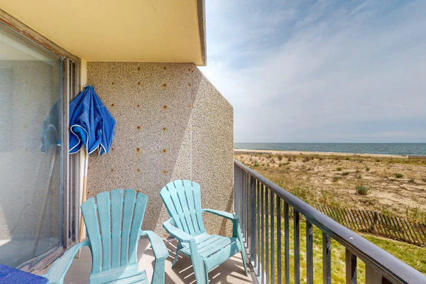 Sea Colony oceanfront condo with private balcony, shared pools, & gym