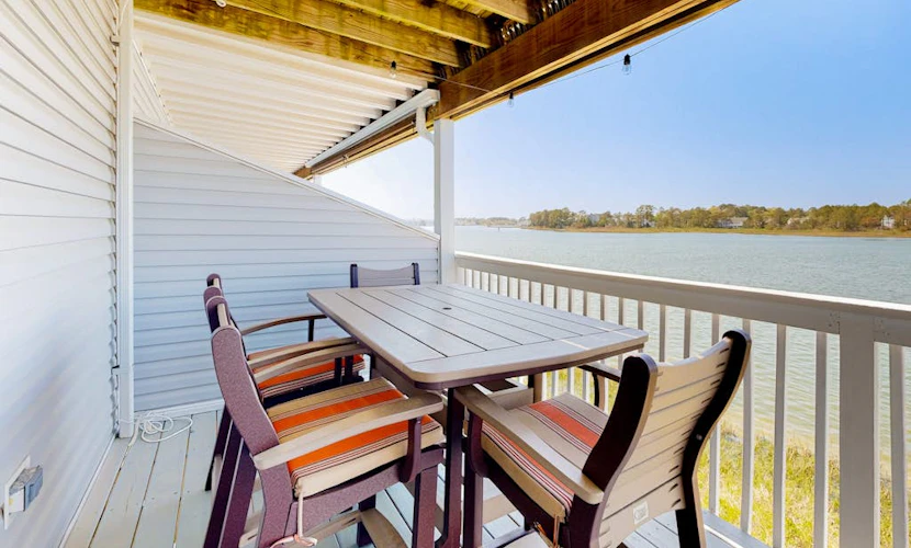 Bethany Marina bayfront condo with pool, fireplace, water views