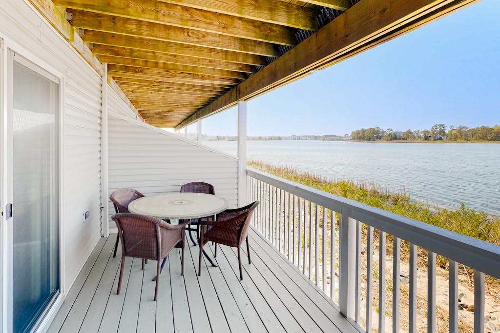 Bethany Marina bayfront condo with pool, fireplace, water views
