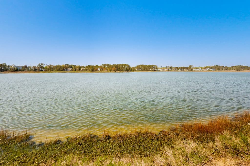 Bethany Marina bayfront condo with pool, fireplace, water views