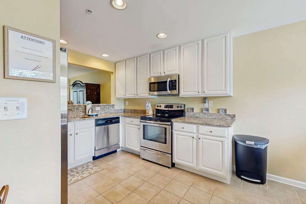 Bethany Bay condo with bay views, athletic courts, pool, fireplace, & balcony
