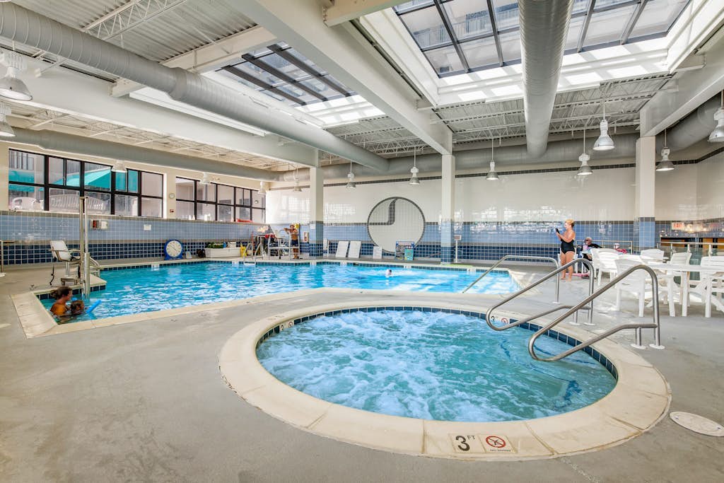 Sea Colony condo with access to pools, tennis courts, gym, & a private beach