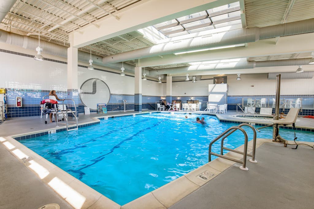 Sea Colony condo with access to pools, tennis courts, gym, & a private beach