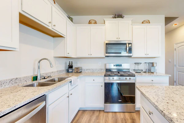 Newly remodeled - dog friendly townhome with pools, tennis, washer/dryer & AC