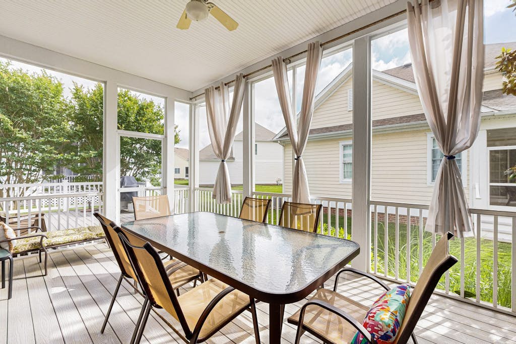 Bayside Resort home with sunroom plus pools, gym, hot tub, & sports courts