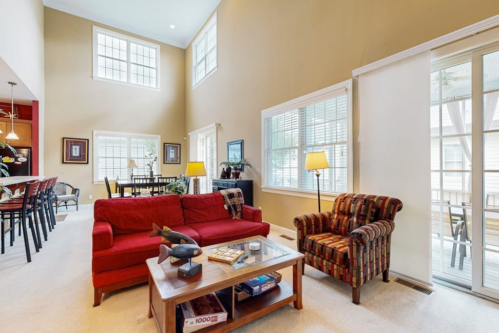 Bayside Resort home with sunroom plus pools, gym, hot tub, & sports courts