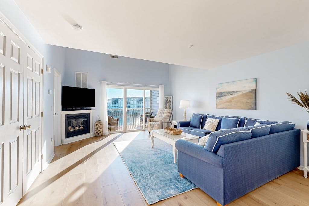 Bethany Bay water-view condo with pool, on-site golf & sports courts access