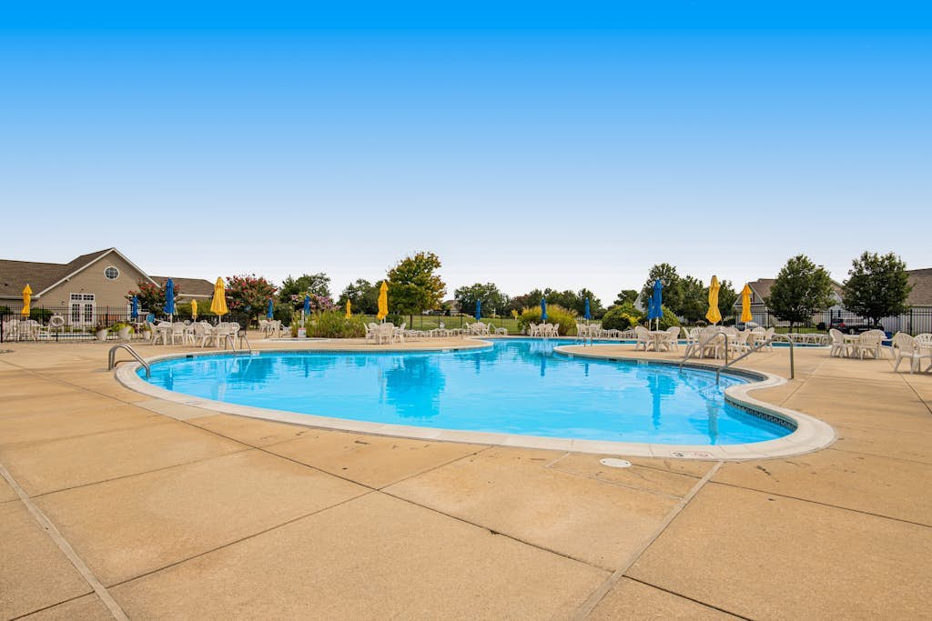 Bethany Bay water-view condo with pool, on-site golf & sports courts access