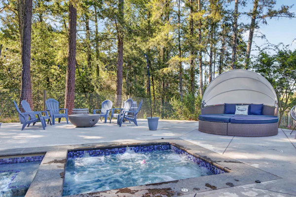 Grab pool floats and chase the pups across the fenced yard — this Sebastopol fun house is built for play-all-day families and up to four dogs. Play foosball, spin shaved ice and homemade ice cream, and serve fresh popcorn from a kitchen stocked so you never have to leave. Seat up to 16 for family dinners inside or outside while one parent slips off to a quiet desk for remote work. Sleeps 8 in four bedrooms. Heated pool and spa ringed by redwoods — Marimar Estate is 0.7 miles down the road.