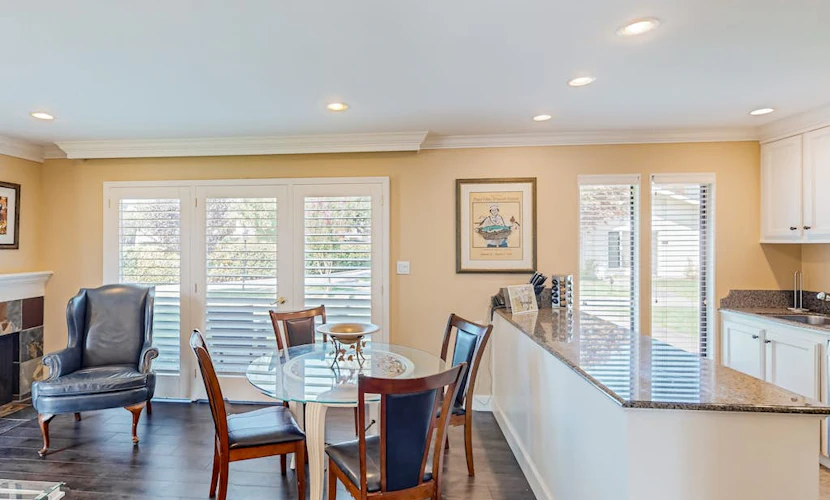 Mature palms shade your private patio at this Silverado condo, where wine country adventures start each morning. This ground-floor condo offers a corner fireplace (firewood not provided), stainless kitchen, and king suite for two. Step outside to the heated pool just across the way. Silverado Market & Bakery is a 2-minute walk; downtown Napa's 55+ tasting rooms are 10 minutes by car. Your wine country retreat balances resort comfort with easy access to everything Napa offers.