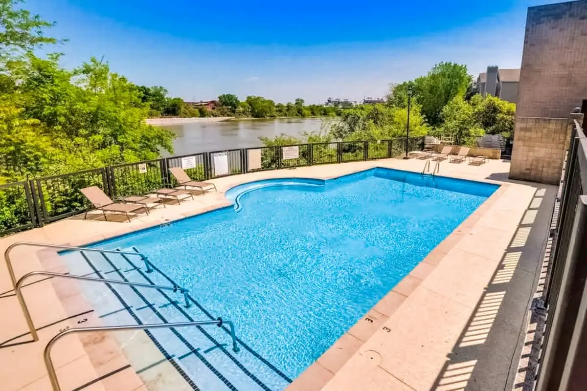 Third-Floor Riverfront Condo w/ Balcony, Pool, & Fast WiFi – Near Broadway!