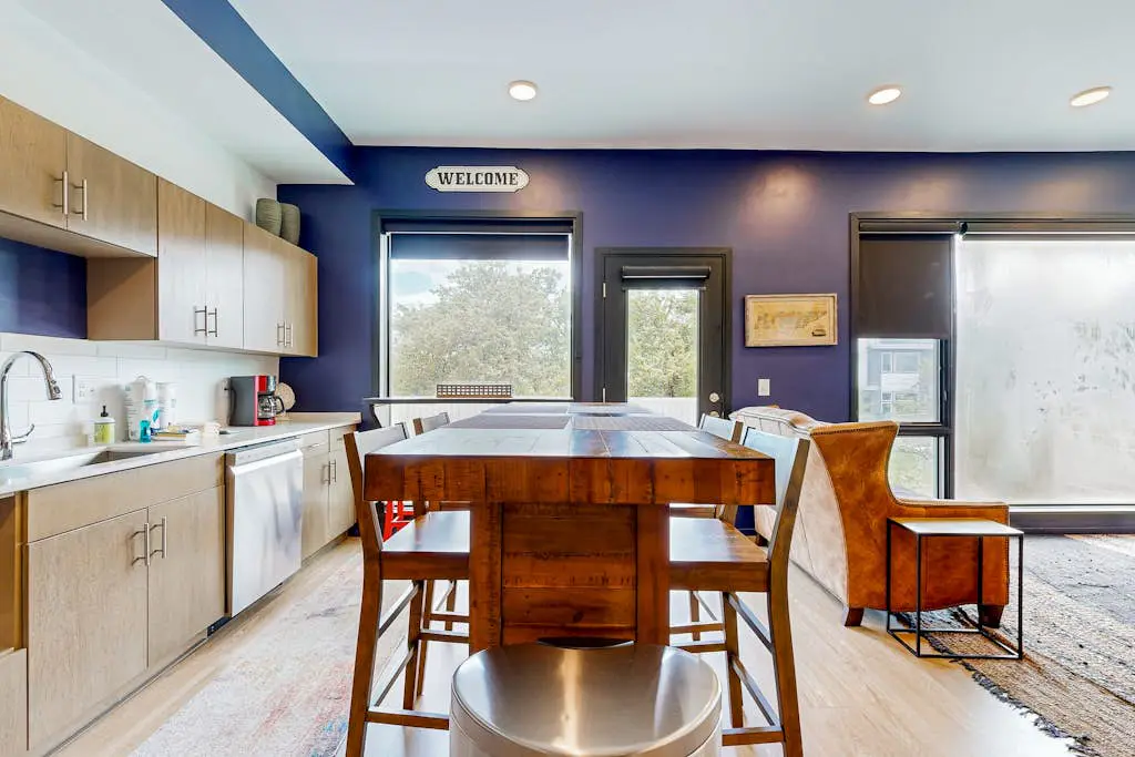 Dog-friendly treetop escape with luxe interior, seasonal pool, balcony, & WiFi