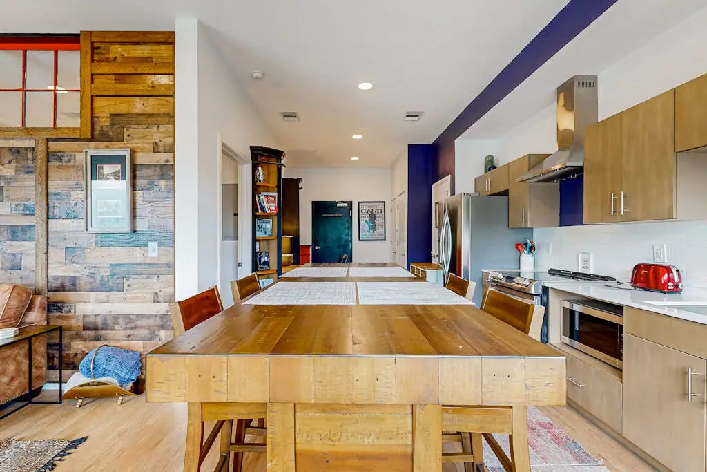 Dog-friendly treetop escape with luxe interior, seasonal pool, balcony, & WiFi