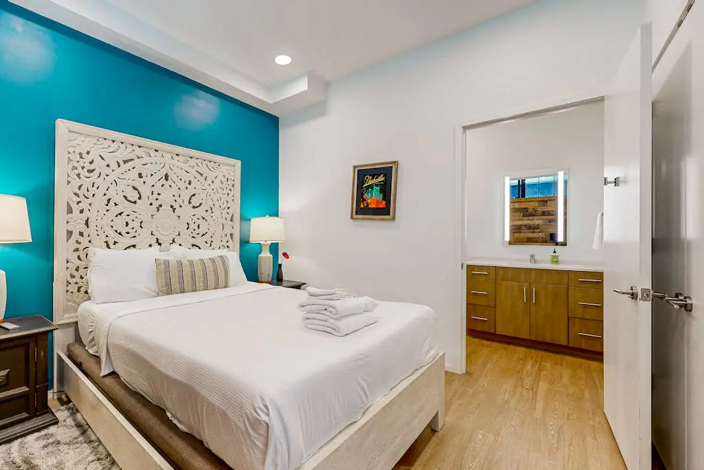 Dog-friendly treetop escape with luxe interior, seasonal pool, balcony, & WiFi