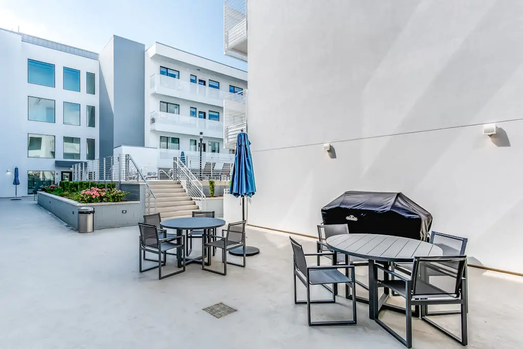 Dog-friendly treetop escape with luxe interior, seasonal pool, balcony, & WiFi