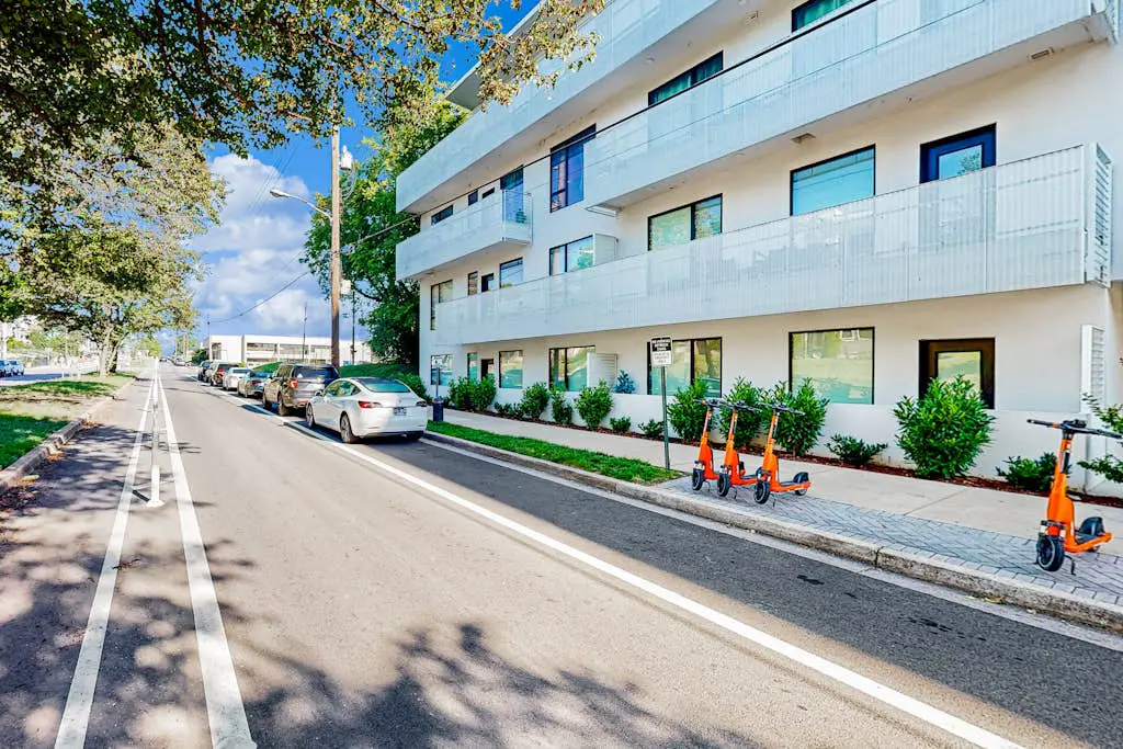 Dog-friendly treetop escape with luxe interior, seasonal pool, balcony, & WiFi
