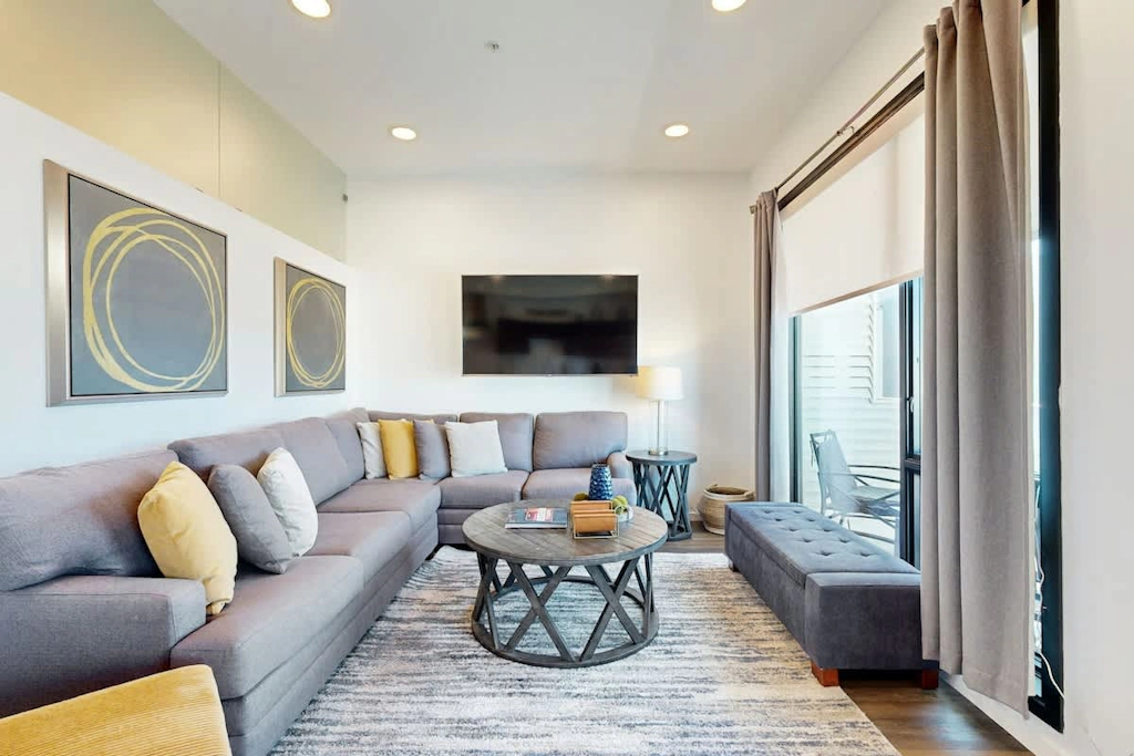 Luxe Top Floor Condo with Balcony, W/D, Seasonal Courtyard Pool, & Gym
