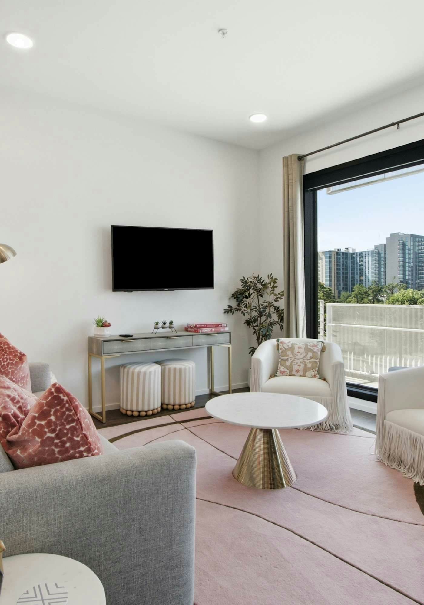 Modern end-unit condo with balcony, AC, washer & dryer, seasonal pool
