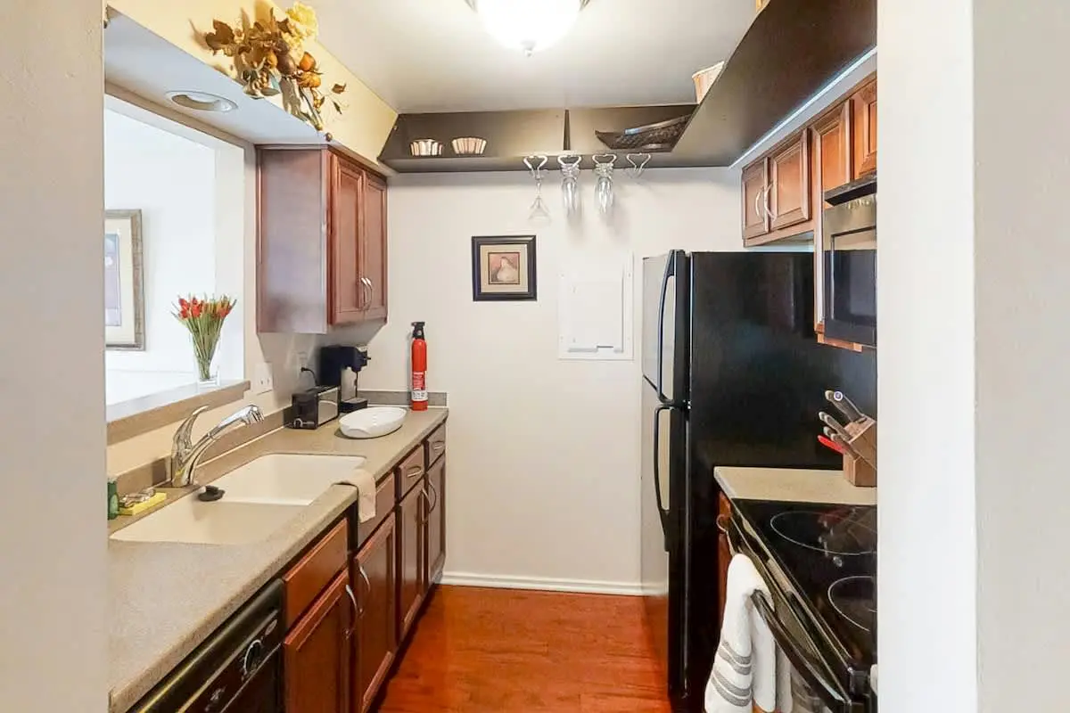 Third-floor riverfront condo with shared pool, fast WiFi, balcony, & central AC