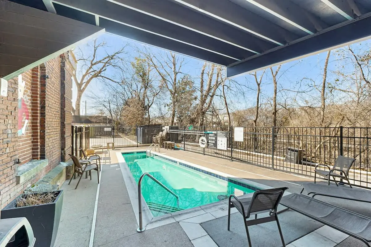 One-of-a-kind condo near downtown - pool, fitness room, central AC, washer/dryer
