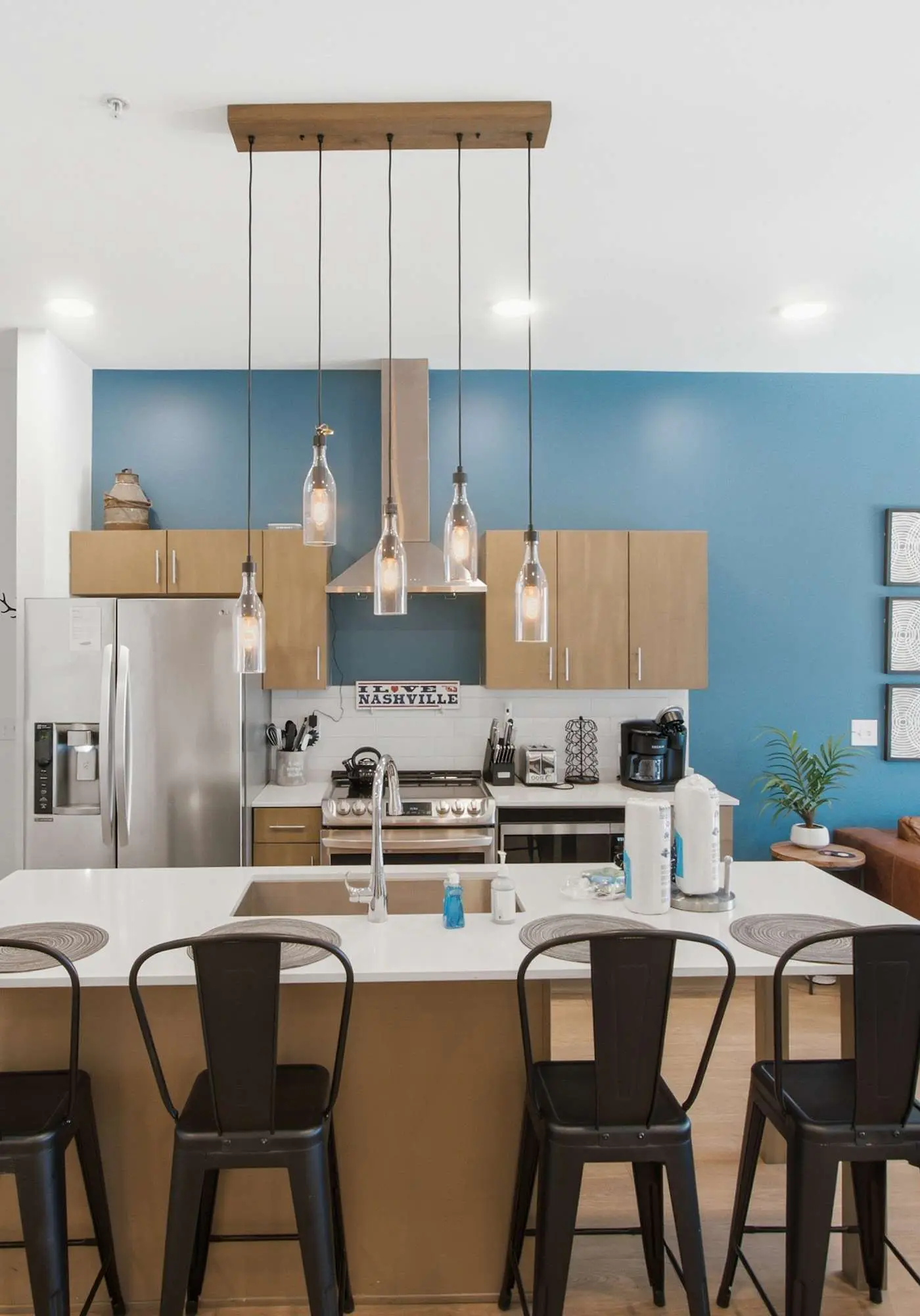 Modern condo near attractions with outdoor pool, balcony, central AC, and WiFi