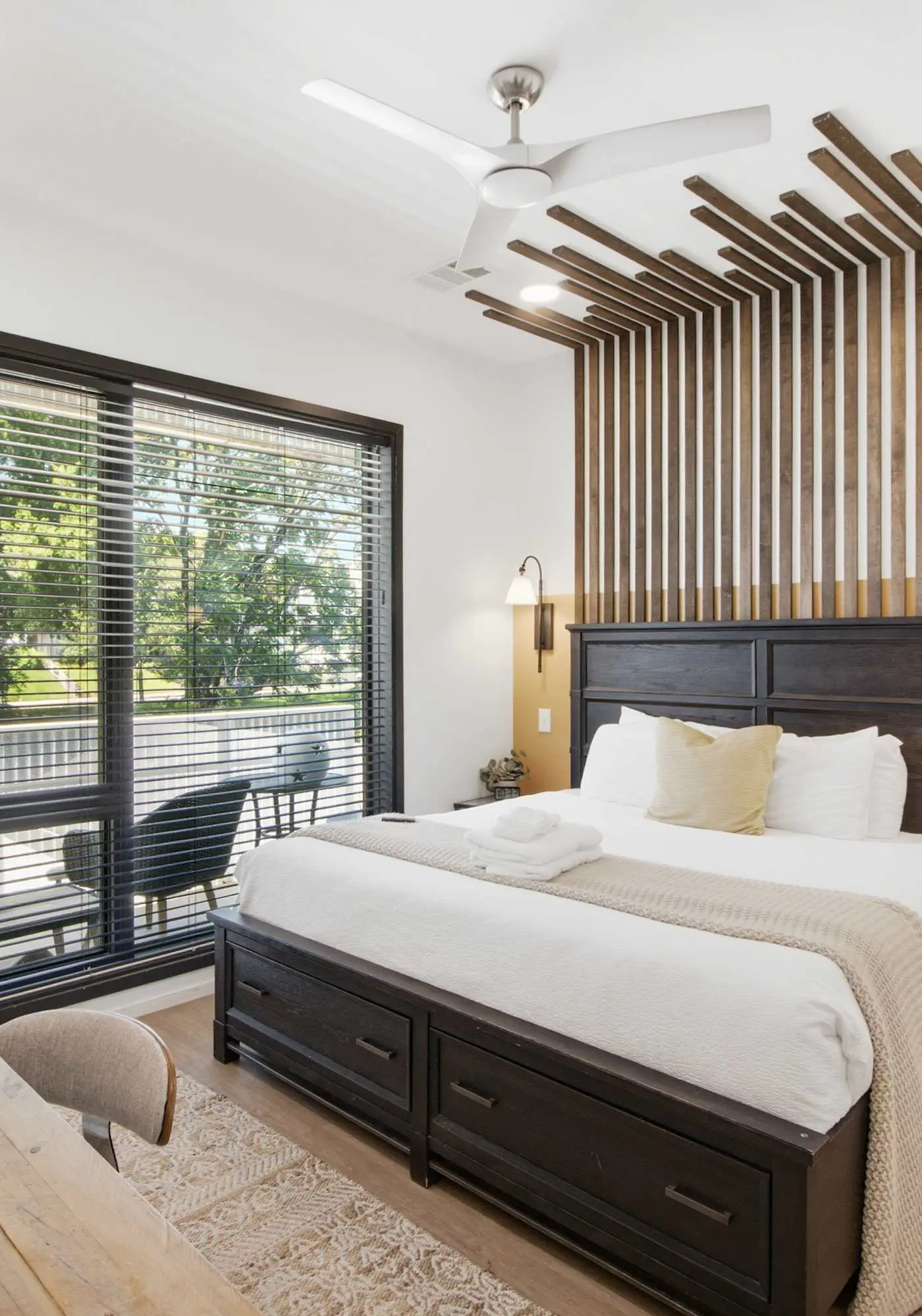 Modern condo near attractions with outdoor pool, balcony, central AC, and WiFi