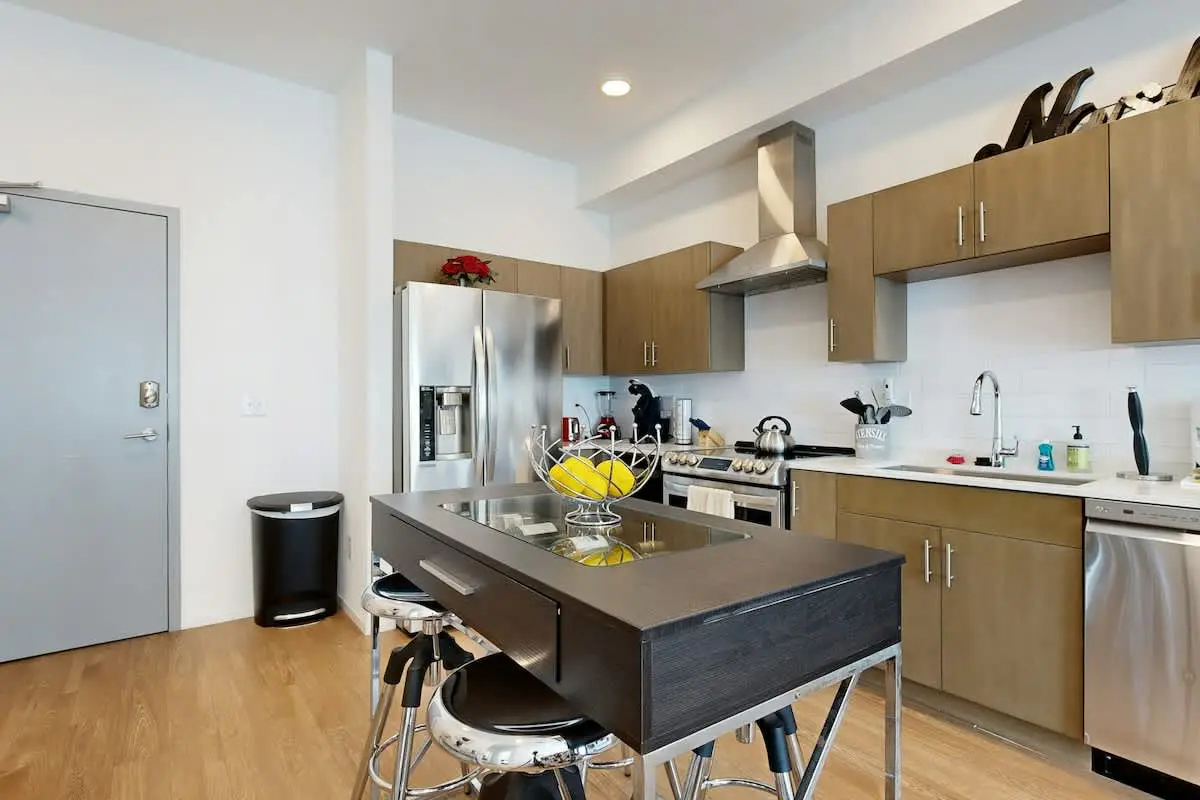 Chic Corner Condo with Balcony, Central AC, W/D, Seasonal Pool, & Gym