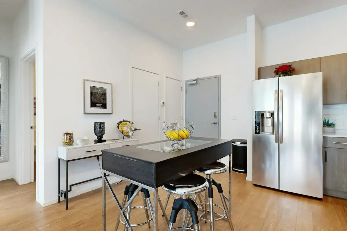 Chic Corner Condo with Balcony, Central AC, W/D, Seasonal Pool, & Gym
