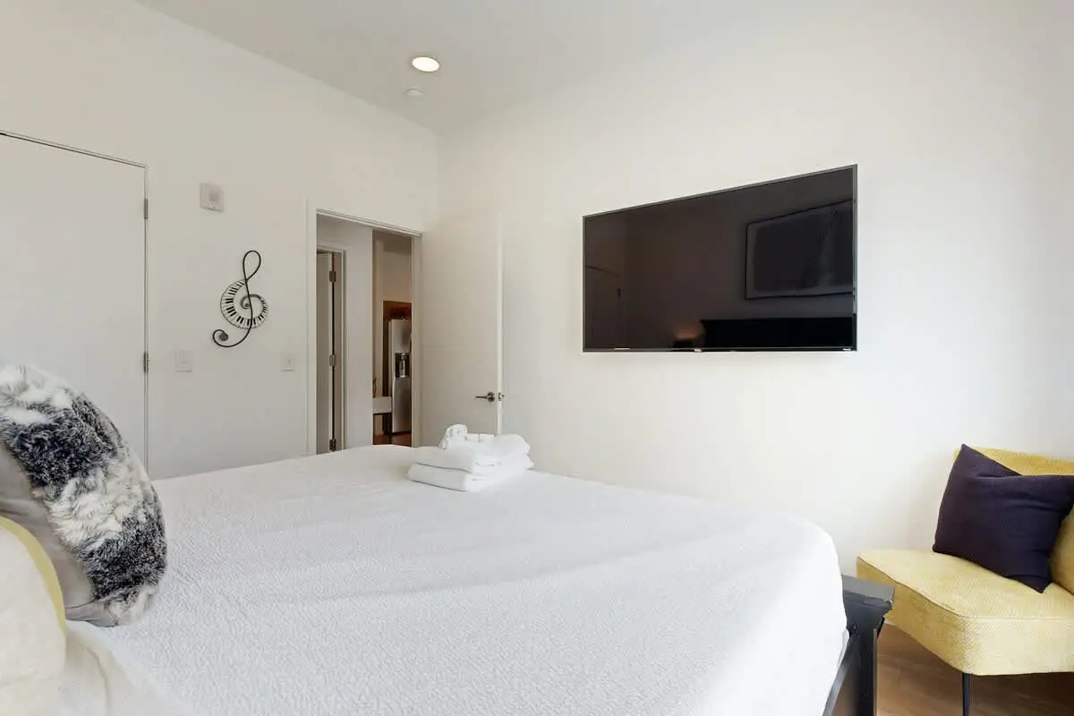 Chic Corner Condo with Balcony, Central AC, W/D, Seasonal Pool, & Gym