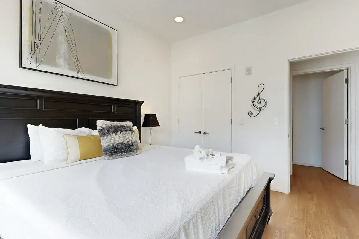 Chic Corner Condo with Balcony, Central AC, W/D, Seasonal Pool, & Gym