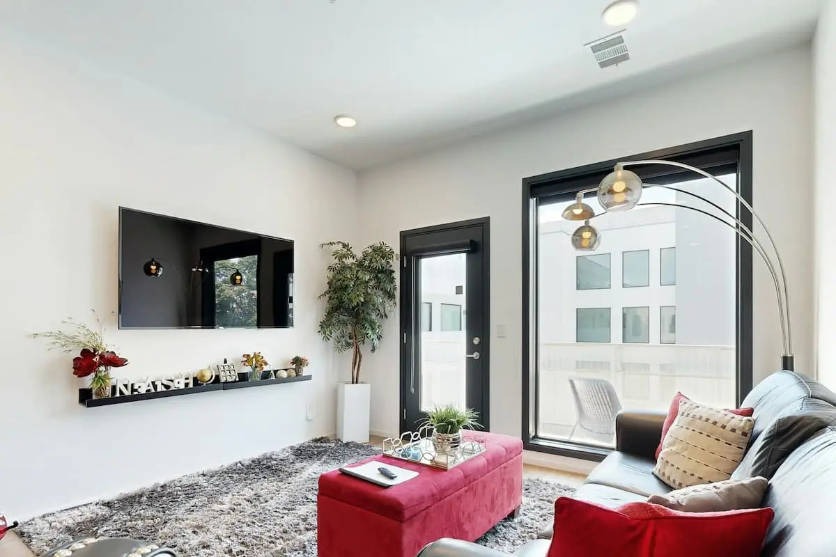 Chic Corner Condo with Balcony, Central AC, W/D, Seasonal Pool, & Gym