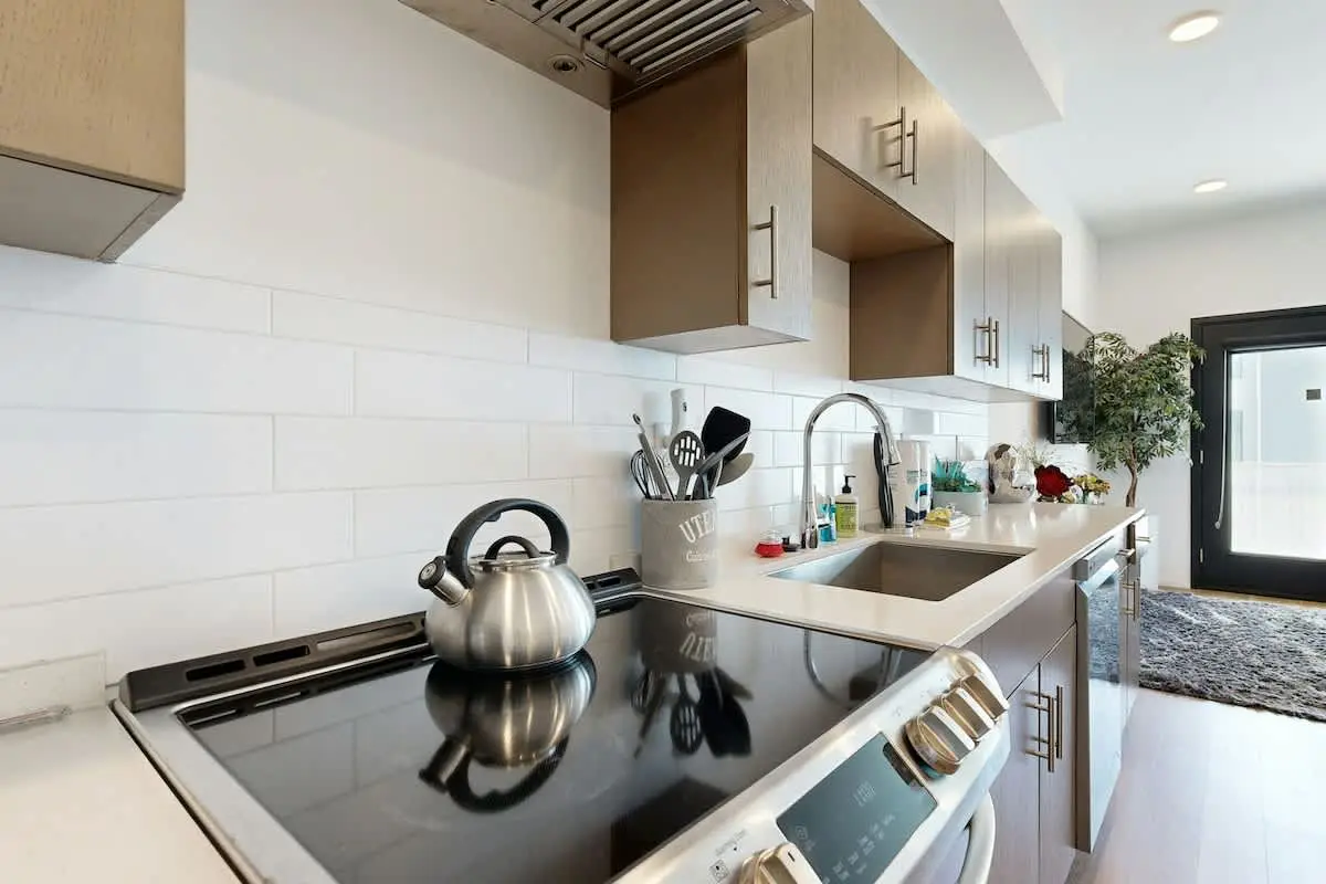 Chic Corner Condo with Balcony, Central AC, W/D, Seasonal Pool, & Gym