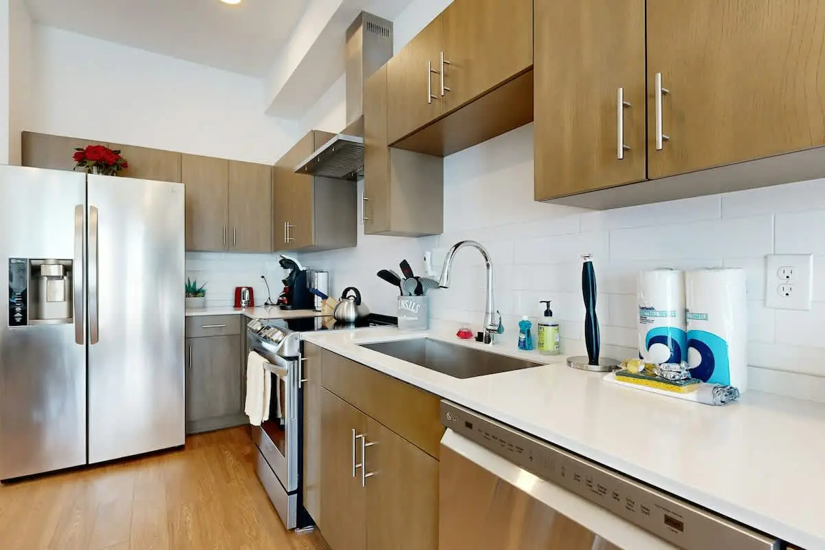 Chic Corner Condo with Balcony, Central AC, W/D, Seasonal Pool, & Gym