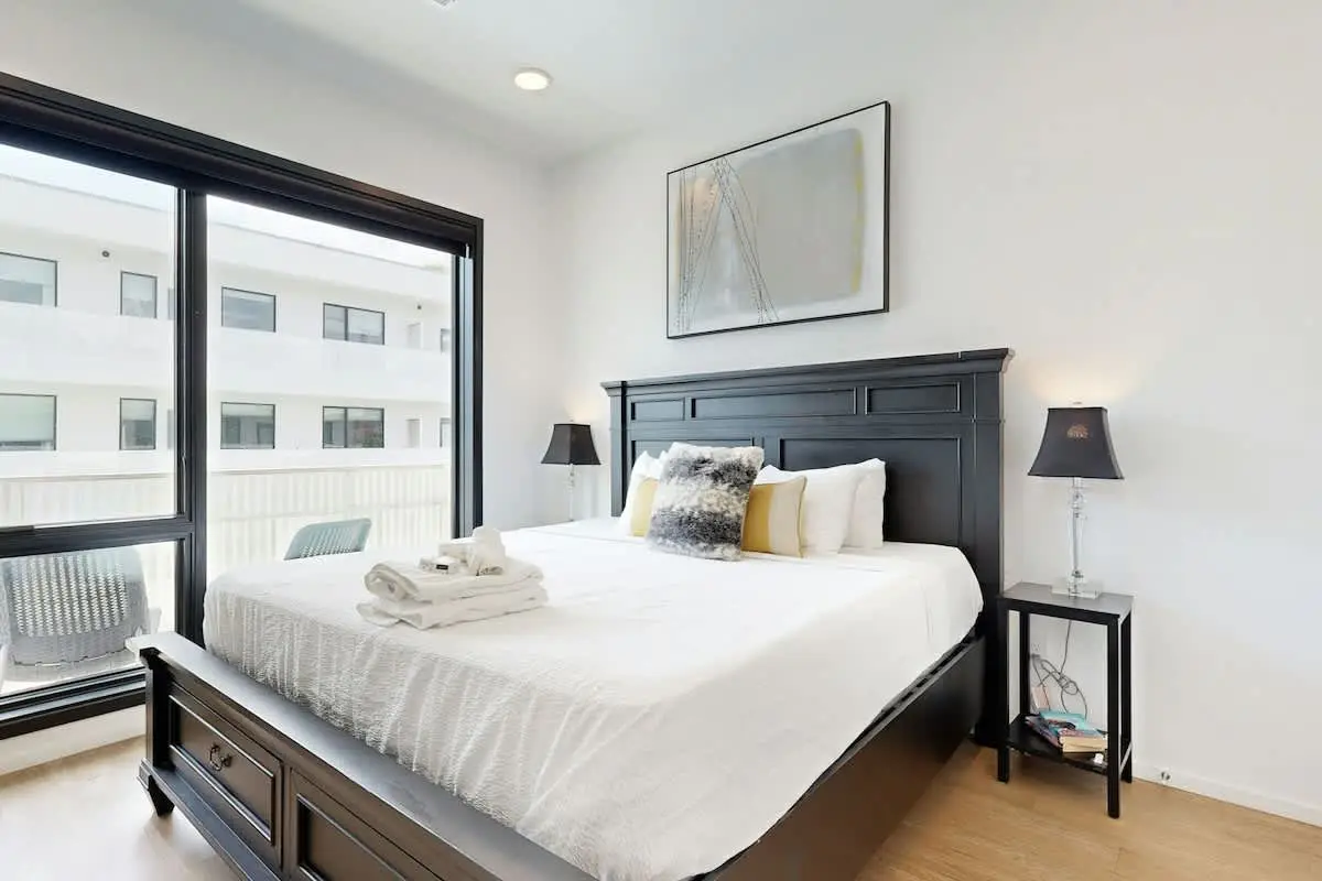 Chic Corner Condo with Balcony, Central AC, W/D, Seasonal Pool, & Gym