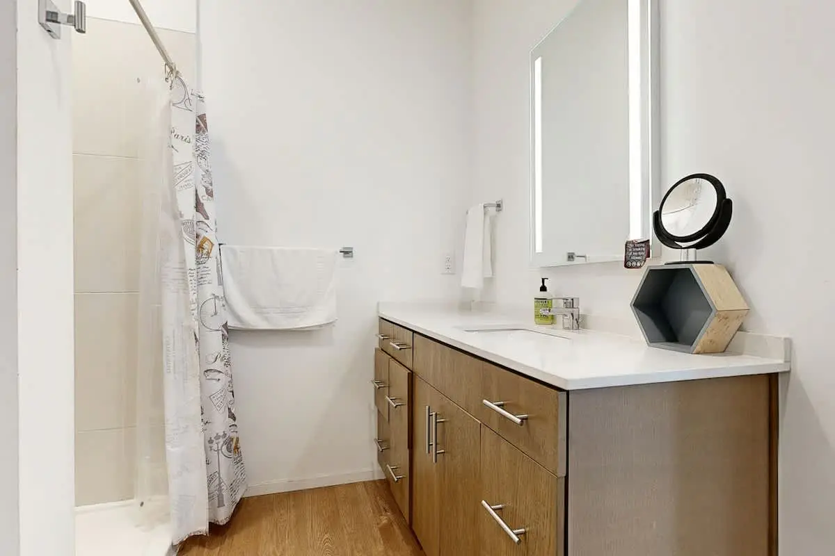 Chic Corner Condo with Balcony, Central AC, W/D, Seasonal Pool, & Gym