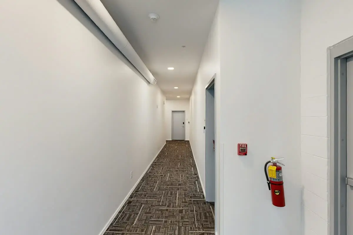 Chic Corner Condo with Balcony, Central AC, W/D, Seasonal Pool, & Gym